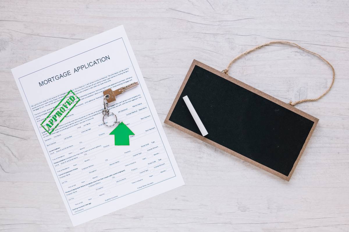 Person reviewing sealed bid documents at a desk.