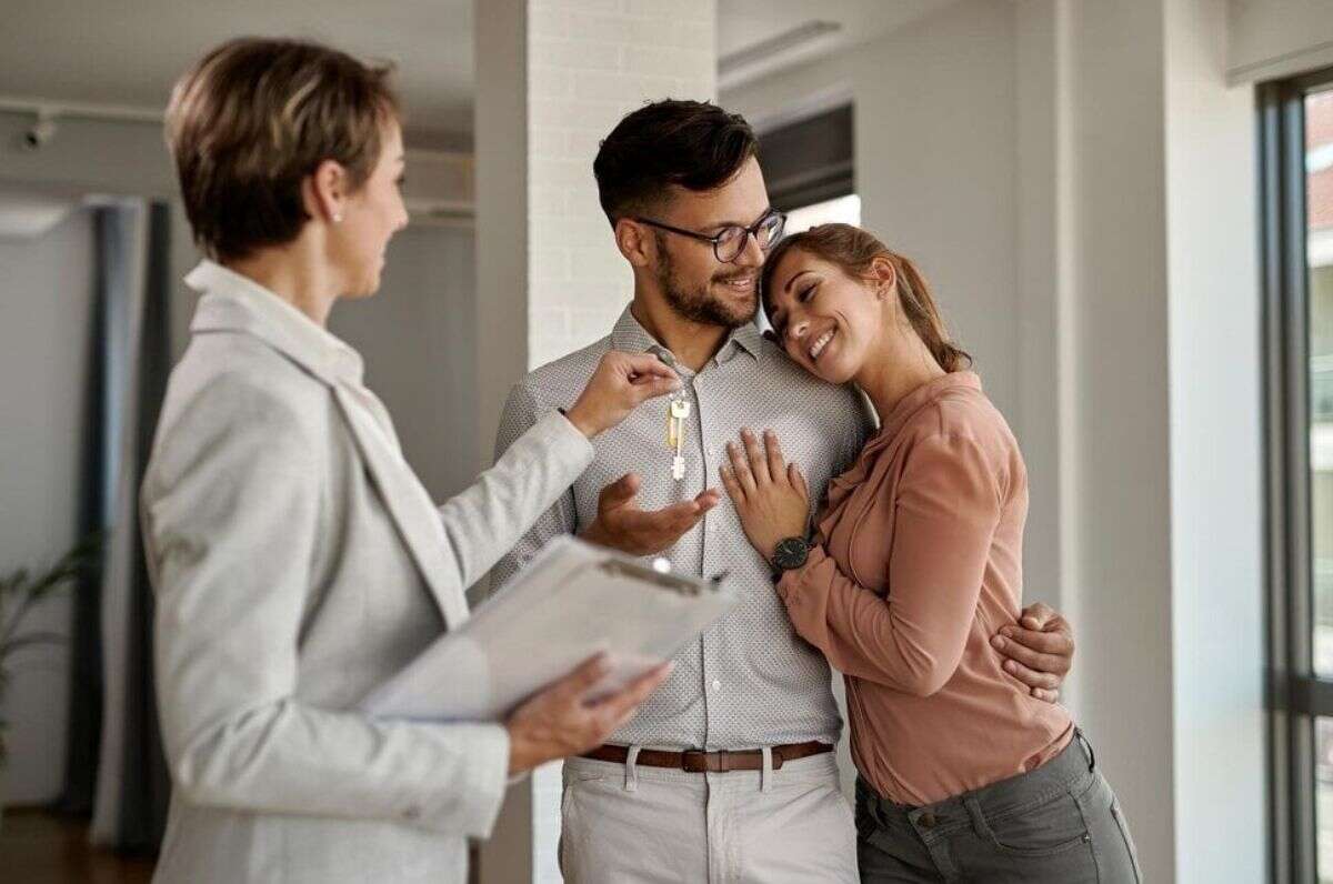 Investors reviewing documents outside a commercial site.