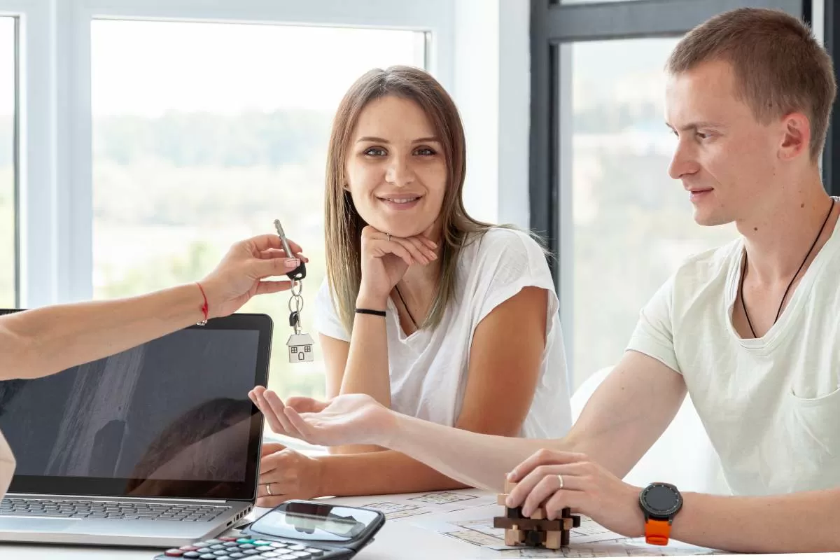 Home valuation process with property experts reviewing rental yields. 